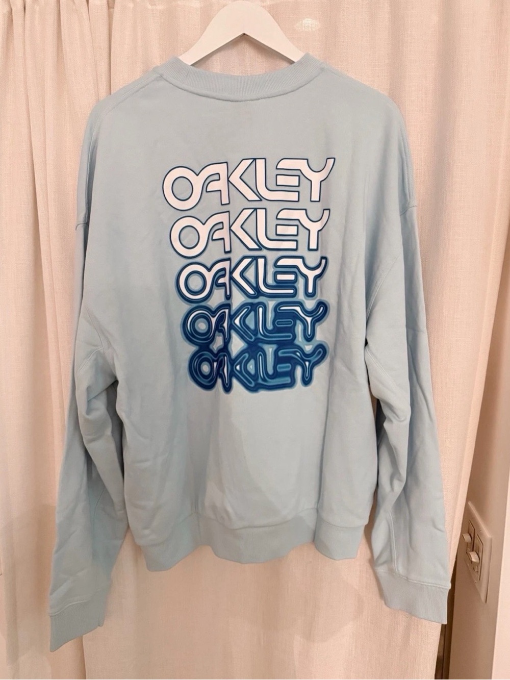 Oakley Men’s Pale Blue Crewneck with Gradient Logo